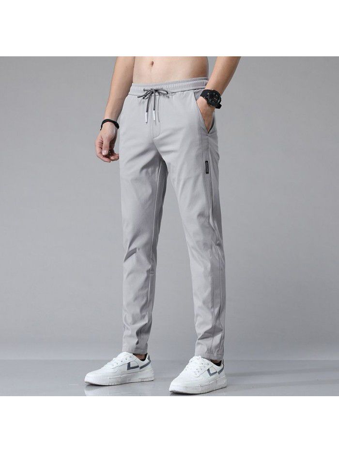 Summer thin ice tide brand casual pants men's youth Korean Trend slim elastic small foot sports pants 