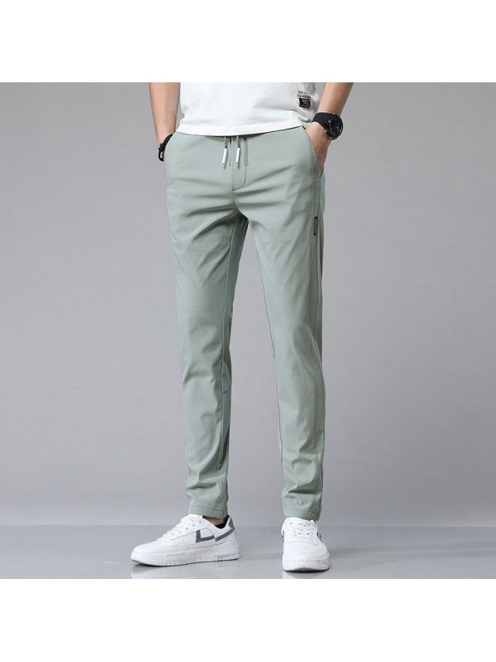 Summer thin ice tide brand casual pants men's youth Korean Trend slim elastic small foot sports pants 