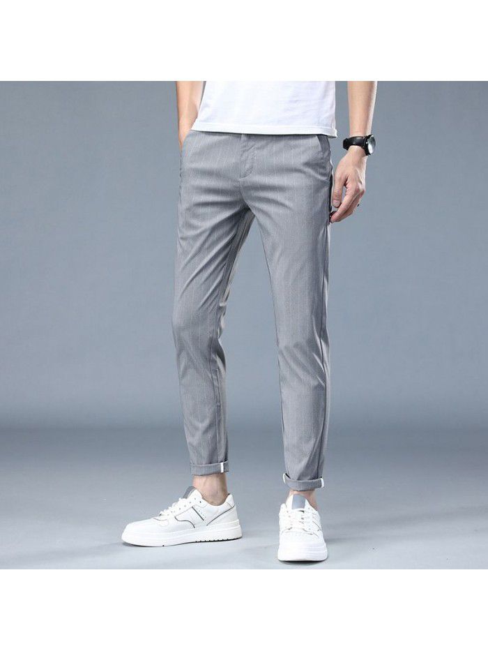 Summer thin striped elastic casual pants men's fashion Korean Slim small straight tube fashion youth Capris 